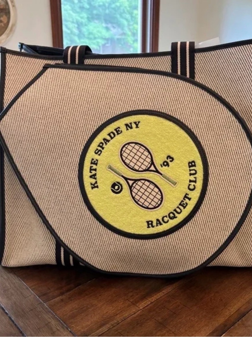 kate spade Beige and Black Tote with Yellow Racquet Club Patch